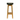 Bar stool with wooden legs and a black cushioned seat on a white background
