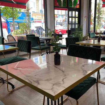 White levanto marble effect tabletops at Fed Watered Acton by DeFrae Contract Furniture 2