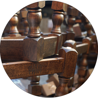 Close up of traditional dark wood carved stools