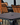 Metal and wooden panel outdoor chairs in a beer garden