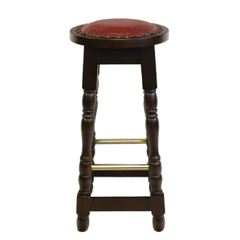 Wooden bar stool with a red leather seat on a white background