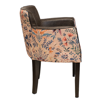 Lisbon tub chair with a pink floral outter fabric and brown vinyl inner