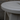 Close-up of a white plastic chair with a blurred background