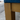 Close-up of a wooden chair with a blue cushion on a blurred background