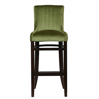 Avon bar chair with a dark walnut stain and fluted green velvet fabric