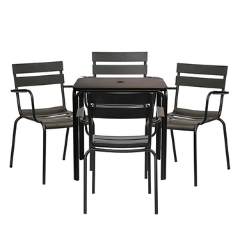 Black dining table with four matching chairs on a white background