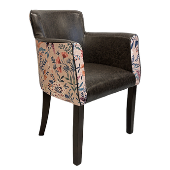Chair with floral-patterned armrests on a white background