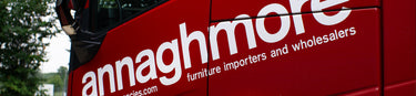 Annaghmore logo on the side of a red van